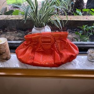 Carlos falchi clutch with strap